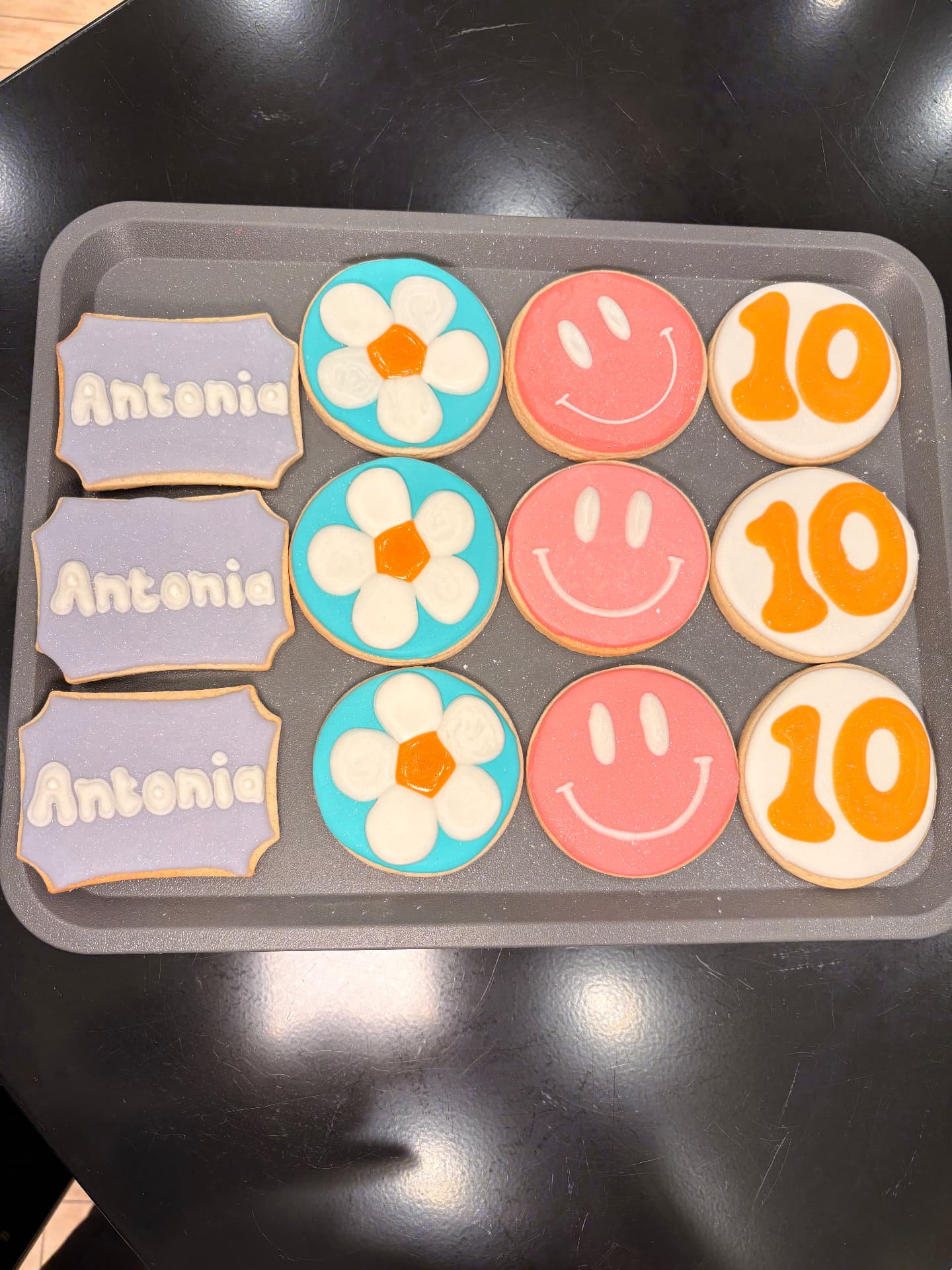 Hand-piped royal icing cookies by Sweet Grace